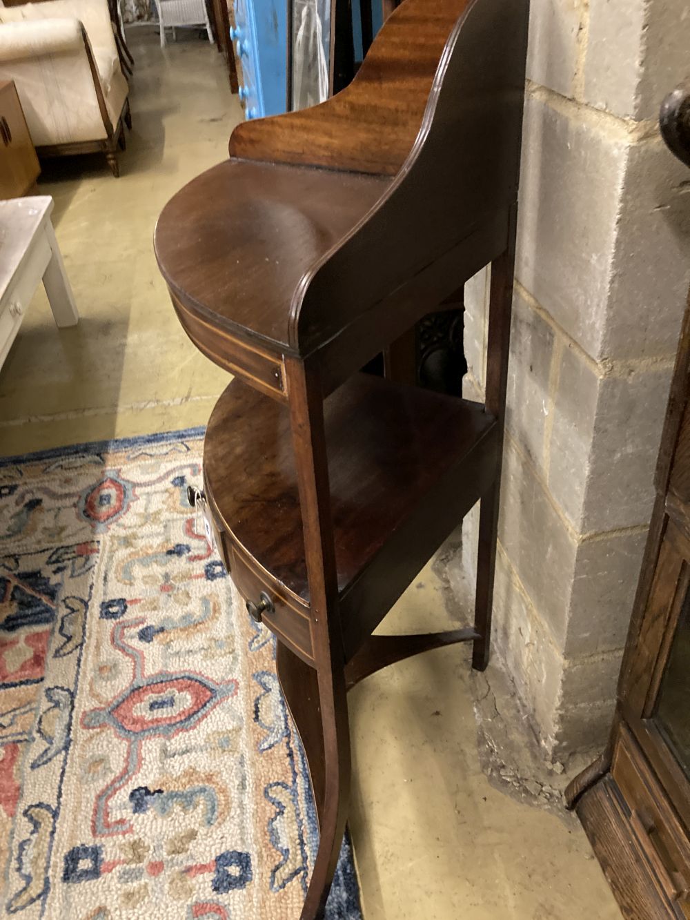 A George III mahogany corner washstand, width 60cm, depth 38cm, height 100cm